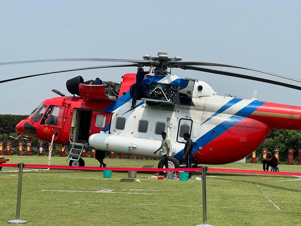 Ground crew servicing the helicopter