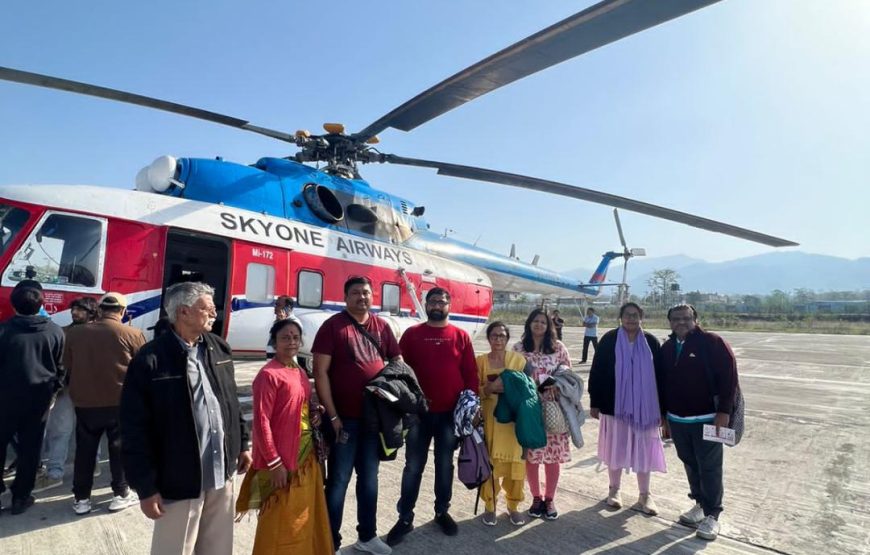 Group of yatris with Sky One Airways helicopter